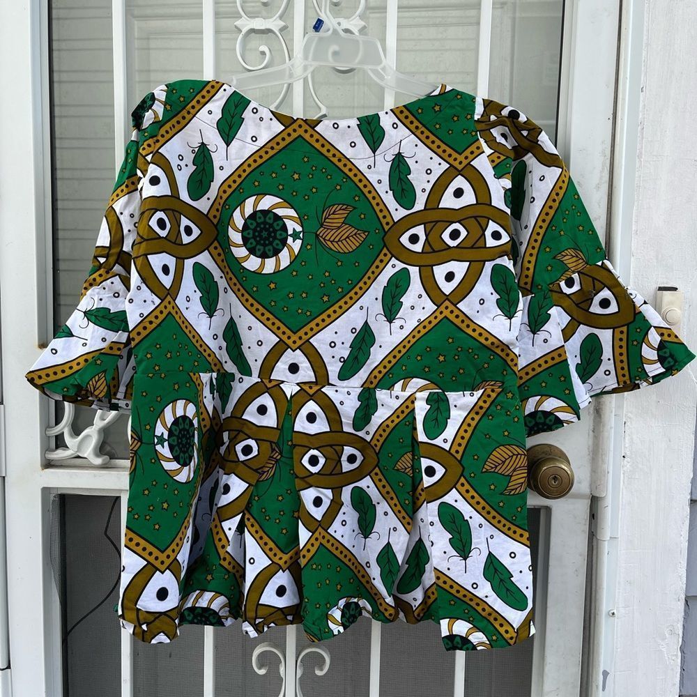 African prints Beautiful size X-Large,brand new.green white and brown patterns ,